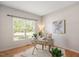 Bright office space with hardwood floors, large window, and neutral decor at 2644 Bloomsberry Ridge Dr, Fuquay Varina, NC 27526