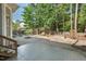 Backyard featuring a play area with swings and a slide, as well as ample green space at 3 Waconda Ct, Durham, NC 27713
