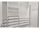 Custom closet with drawers and shelves, providing ample storage space for organizing clothes at 3 Waconda Ct, Durham, NC 27713