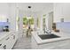 Open kitchen with granite countertops, stainless steel appliances, and eat-in breakfast nook at 3 Waconda Ct, Durham, NC 27713