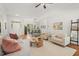 Comfortable living room with hardwood floors, lots of light from the front door, and adjacent dining area at 3 Waconda Ct, Durham, NC 27713