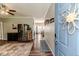 Open foyer with hardwood floors and views of the dining area at 3564 Lower Moncure Rd, Sanford, NC 27330