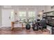 Well-lit home office with a workstation and a view of the outdoors at 3564 Lower Moncure Rd, Sanford, NC 27330
