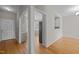 Inviting entryway featuring hardwood floors and a neutral color palette that creates a warm and welcoming atmosphere at 400 Nottinghill Walk, Apex, NC 27502