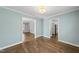 Open dining area with hardwood floors that offers seamless transitions to other living spaces at 405 E Millbrook Rd, Raleigh, NC 27609