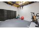 Spacious basement area featuring workout equipment and ample room for activities at 409 Englewood Dr, Chapel Hill, NC 27514