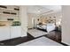Inviting main bedroom features a tray ceiling, an open shelving unit and a wrought iron bed at 409 Englewood Dr, Chapel Hill, NC 27514