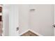Bright entryway featuring durable flooring, white walls, and convenient coat hooks at 4102 Catfish Way, Durham, NC 27703