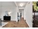 Inviting foyer with wood flooring, neutral paint, leading to living areas and bedrooms at 4102 Catfish Way, Durham, NC 27703