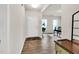 Bright foyer space with wood flooring, neutral paint, adjacent to the office at 4102 Catfish Way, Durham, NC 27703