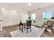 Bright office space with natural light, wood flooring and a view of the front yard at 4102 Catfish Way, Durham, NC 27703