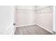 A simple walk-in closet with basic shelving at 4102 Catfish Way, Durham, NC 27703