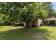 Charming home with a well-maintained front yard and a quaint carport at 416 Forrest St, Hillsborough, NC 27278