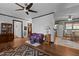 Open-concept living space showcases hardwood floors connecting the kitchen at 416 Forrest St, Hillsborough, NC 27278