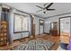Bright living room featuring hardwood floors, ample lighting, and classic decor at 416 Forrest St, Hillsborough, NC 27278