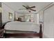 Spacious main bedroom features ceiling fan, doors to Primary bath and nice natural light from the window at 416 Forrest St, Hillsborough, NC 27278