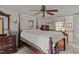 Spacious main bedroom features ceiling fan, and nice natural light from the window at 416 Forrest St, Hillsborough, NC 27278