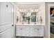 Bathroom with double vanity, vessel sinks, and modern lighting at 42 Juneberry Dr, Chapel Hill, NC 27516