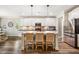 Spacious kitchen with a large center island, modern appliances, and stylish pendant lighting at 42 Juneberry Dr, Chapel Hill, NC 27516