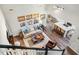 Open concept living room featuring hardwood floors, a comfortable seating area, and abundant natural light at 42 Juneberry Dr, Chapel Hill, NC 27516