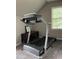 Exercise room with a treadmill, window, dark cabinet, and carpeted floor at 433 Turnberry Dr, Mebane, NC 27302