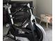 Exercise room featuring a stationary bike, stool, and dark wood dresser at 433 Turnberry Dr, Mebane, NC 27302
