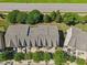 Aerial shot displays neat townhomes with well-kept lawns and tree-lined streets at 453 Panorama Park Pl, Cary, NC 27519