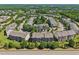 Townhome community surrounded by lush greenery, offering a serene living environment at 453 Panorama Park Pl, Cary, NC 27519