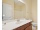 Full bathroom featuring a white countertop vanity and toilet with tile flooring at 453 Panorama Park Pl, Cary, NC 27519