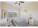 Bedroom with large window, desk and chair, and carpeted floors at 453 Panorama Park Pl, Cary, NC 27519