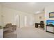 Large room with neutral colors and natural lighting plus couch and home office setup at 453 Panorama Park Pl, Cary, NC 27519