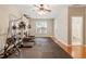 Basement featuring gym equipment, ample space, and easy access to the outdoors at 4533 Pale Moss Dr, Raleigh, NC 27606