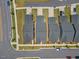 An aerial shot of new townhomes showcasing rooftops and adjacent street parking at 4716 Crescent Square St # 1314, Raleigh, NC 27616