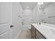 Bathroom features a tub and shower combo with a vanity at 4716 Crescent Square St # 1314, Raleigh, NC 27616