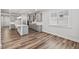 Bright and modern kitchen with gray cabinets, white countertops, and natural light at 4716 Crescent Square St # 1314, Raleigh, NC 27616