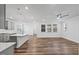 Spacious open floor plan featuring modern kitchen and living area with ample natural light at 4716 Crescent Square St # 1314, Raleigh, NC 27616