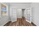 Office with hardwood floors, crown molding, and French doors at 4716 Crescent Square St # 1314, Raleigh, NC 27616