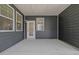 The screened patio offers an outdoor living space with views of the surrounding neighborhood at 4716 Crescent Square St # 1314, Raleigh, NC 27616