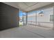 The screened patio offers an outdoor living space with views of the surrounding neighborhood at 4716 Crescent Square St # 1314, Raleigh, NC 27616