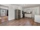 Kitchen with stainless steel appliances, white cabinets, wood countertops and a stainless steel refrigerator at 500 Ellen Dr, Knightdale, NC 27545