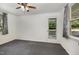 Sun room with neutral paint, carpet and a door to the backyard at 500 Ellen Dr, Knightdale, NC 27545