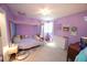 Whimsical bedroom featuring an adorable canopy bed and vibrant colors at 5112 Stephens Ln, Durham, NC 27712
