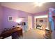 Bright bedroom with whimsical decor, built in nook, desk, and plush carpeting at 5112 Stephens Ln, Durham, NC 27712