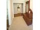 Welcoming foyer features tile flooring and a decorative wood bench at 5112 Stephens Ln, Durham, NC 27712