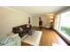 Cozy living room boasts hardwood floors, a neutral color palette, and an inviting ambiance at 5112 Stephens Ln, Durham, NC 27712