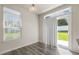 Dining area with a sliding glass door leading to the backyard at 523 Berry Chase Way, Cary, NC 27519