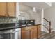 Kitchen featuring granite countertops and stainless steel dishwasher at 523 Berry Chase Way, Cary, NC 27519