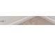 Angled view of an installed wood flooring product in a residential setting at 5235 Red Crimson Dr, Willow Springs, NC 27592