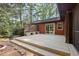 Spacious back deck with built-in seating offers a relaxing outdoor space at 5315 Mccormick Rd, Durham, NC 27713