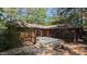 The backyard features a fire pit, deck, and cozy sitting area perfect for entertaining guests at 5315 Mccormick Rd, Durham, NC 27713